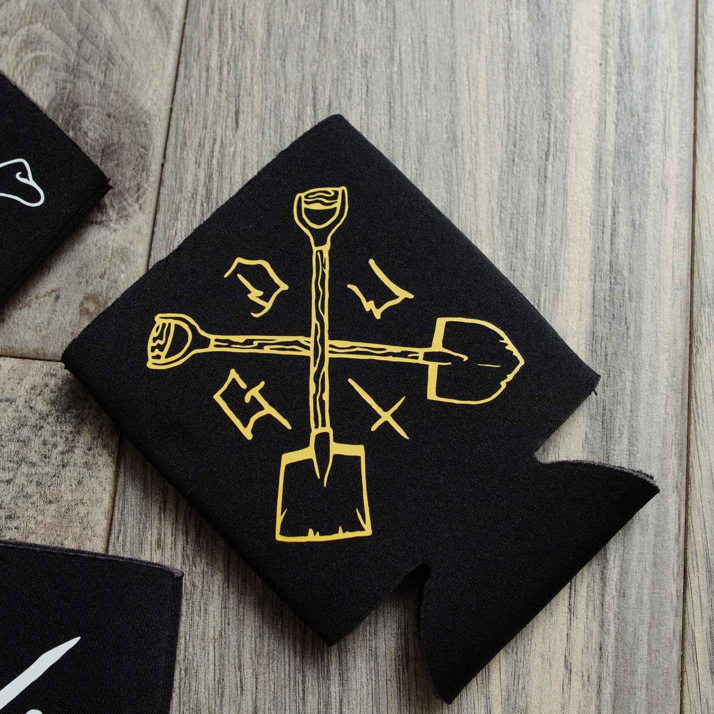 Shovel Gold Beer Koozie.